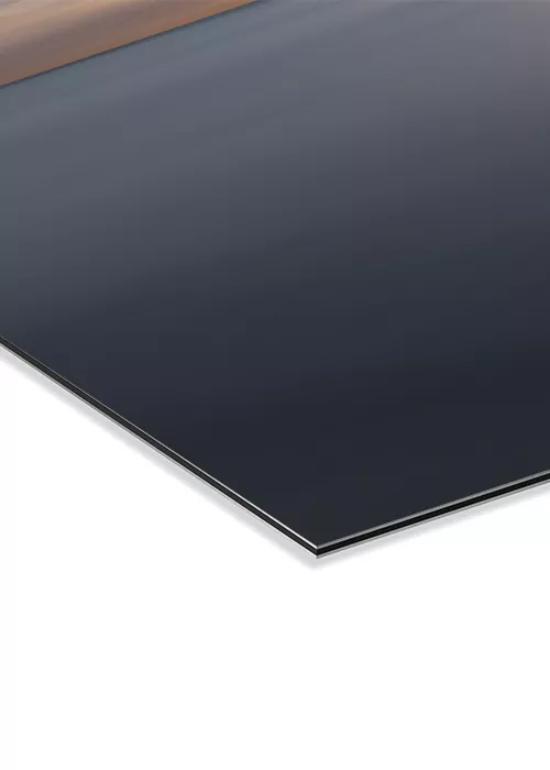 Wandbild mit einem Sonnenkegel auf dem Meer auf AluDibond